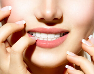 Woman smiling showing white teeth