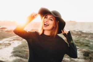 woman in black hat